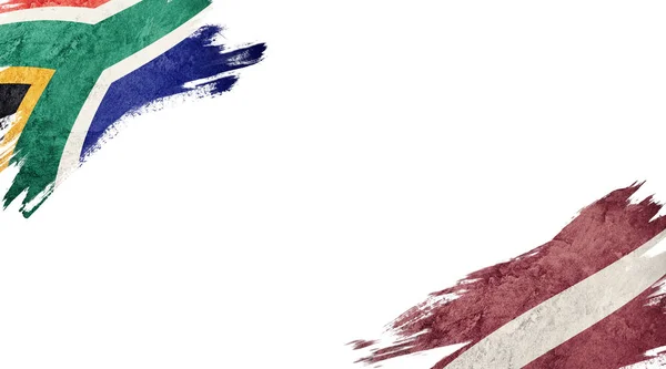 흰 바탕에 있는 남아프리카 공화국 과 라트비아의 국기 — 스톡 사진
